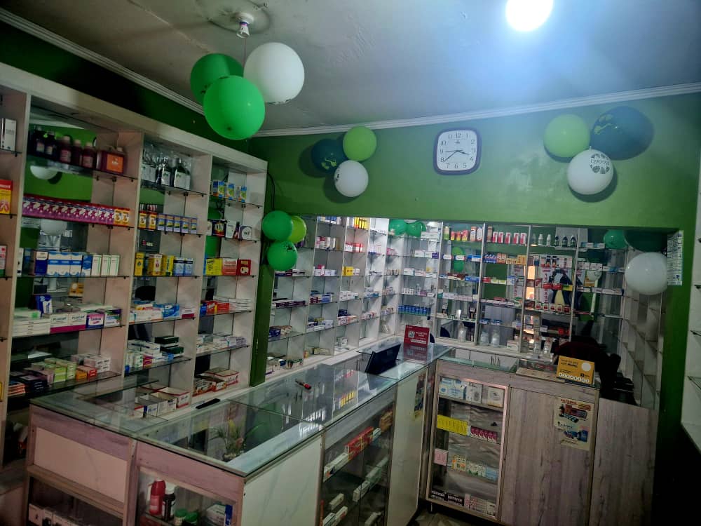 Bweza Pharmacy shelves and service counter